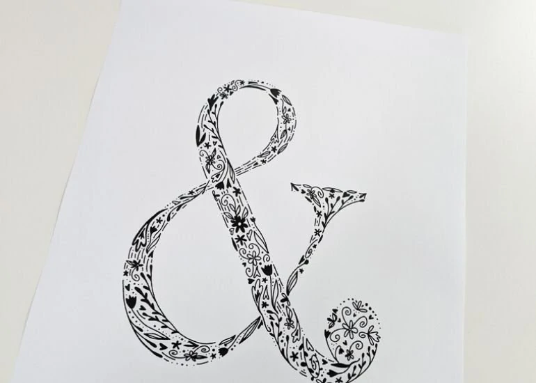 art print featuring ampersand in a floral design