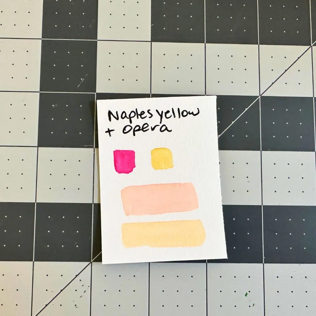 opera pink and Naples yellow watercolor mixture creating peach