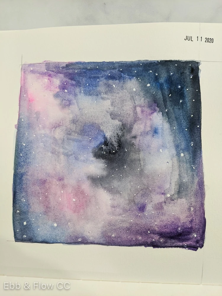 galaxy painting in sketchbook