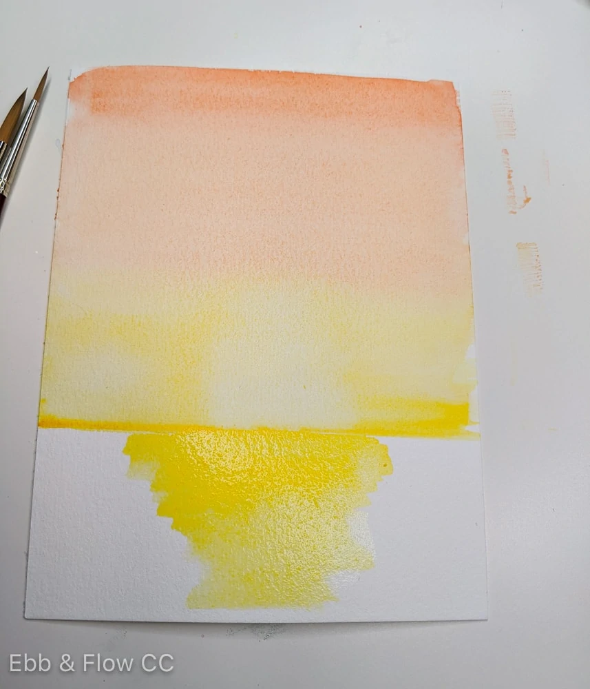adding yellow to water in sunset painting