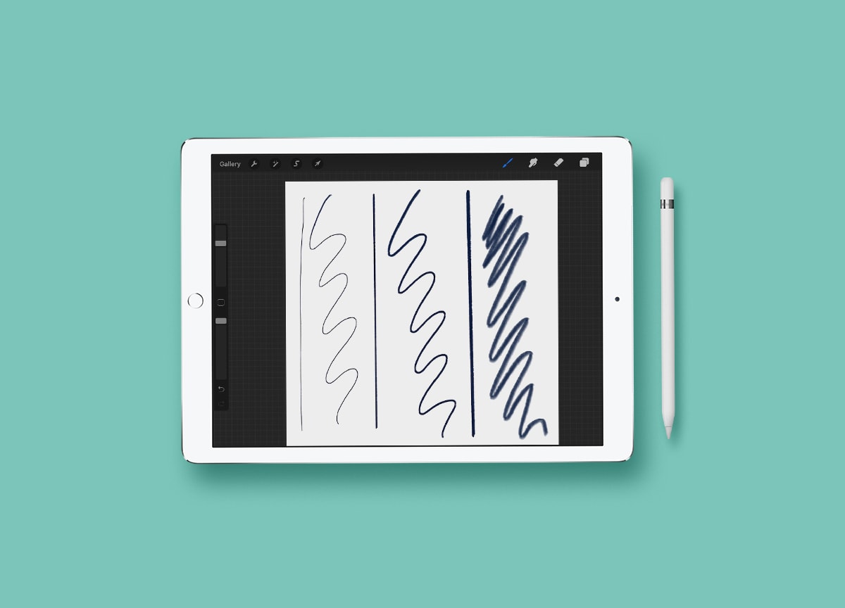 ipad mockup with pencil scribbles on aqua background