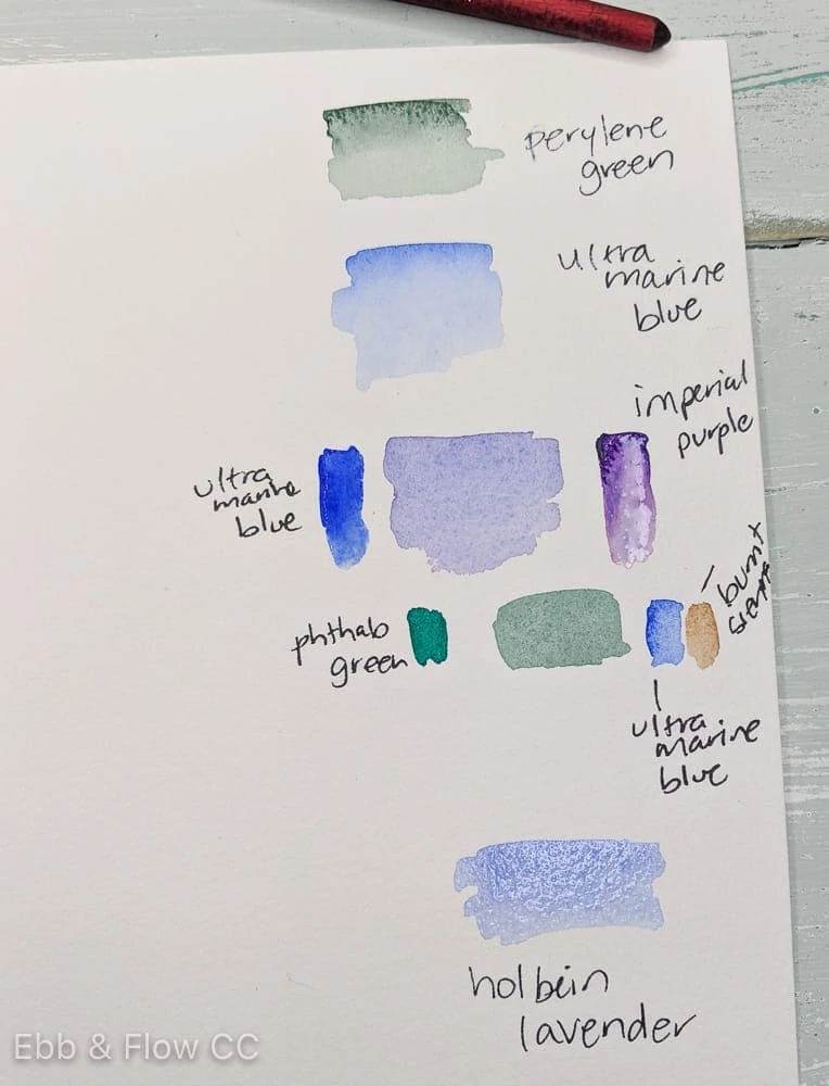 watercolor mixes to get colors for lavender flowers and stems (watercolor swatches on paper)