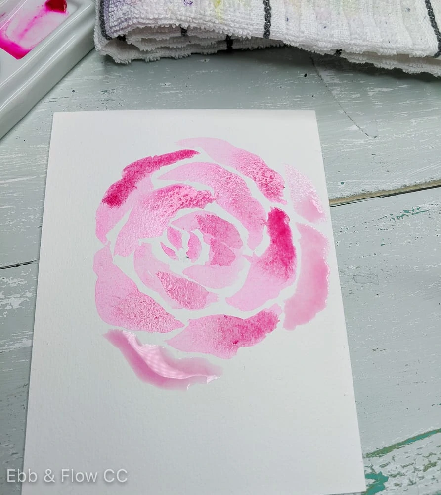 dropping in watercolor paint colors into wet paint in roses