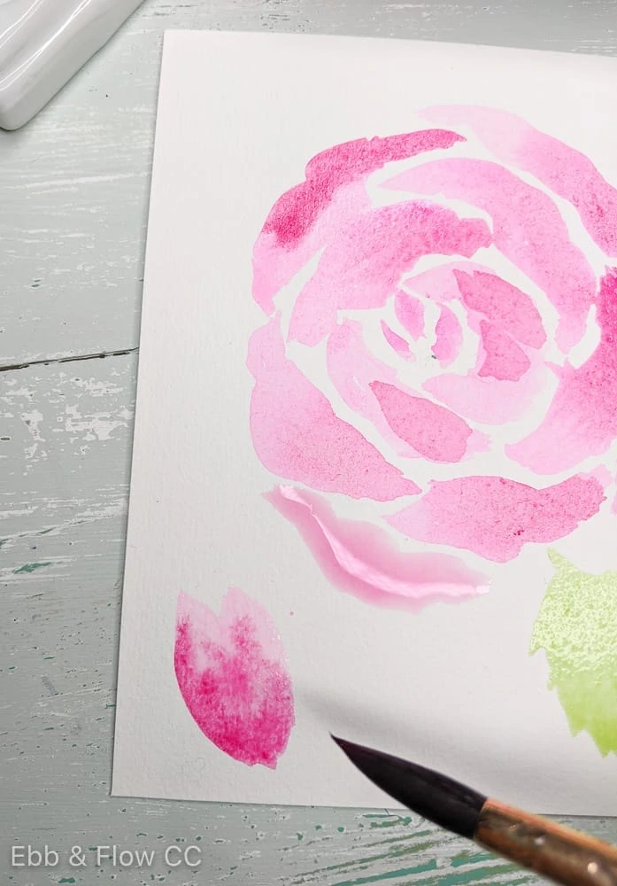 adding to rosebud with watercolor paint