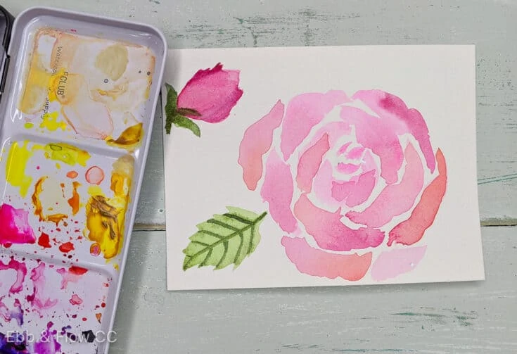 pink watercolor rose with watercolor palette