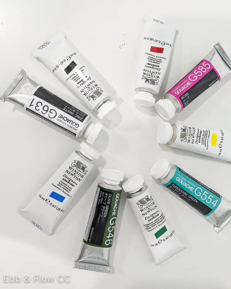 tubes of gouache paint in a circle