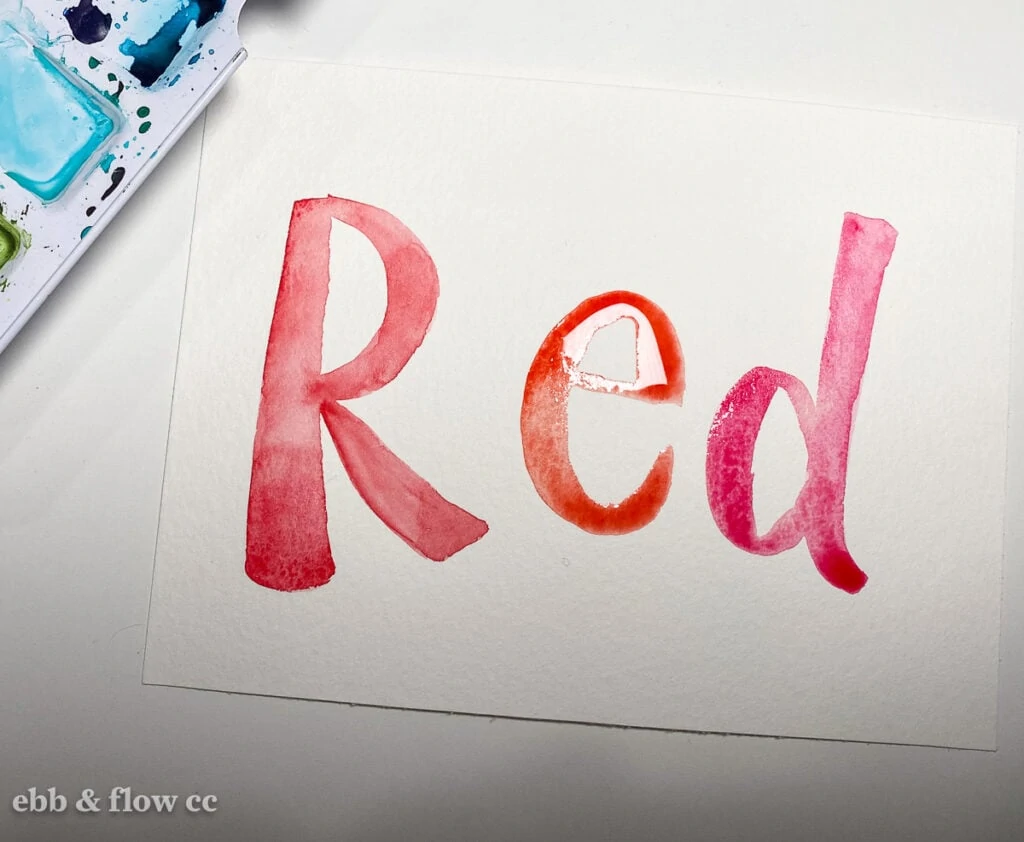 hand-lettered watercolor "red"