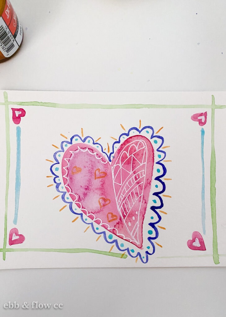 watercolor doodle embellished with paint pens and ink