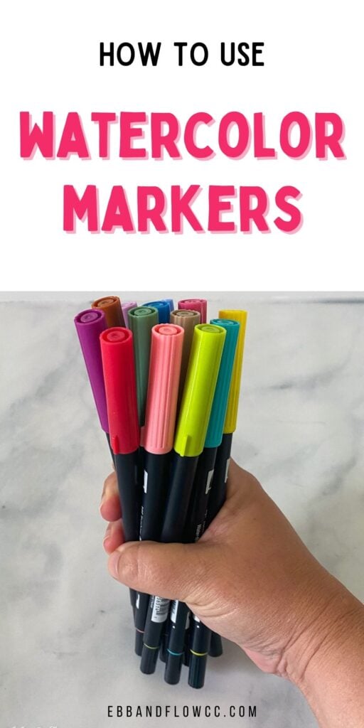 hand holding markers