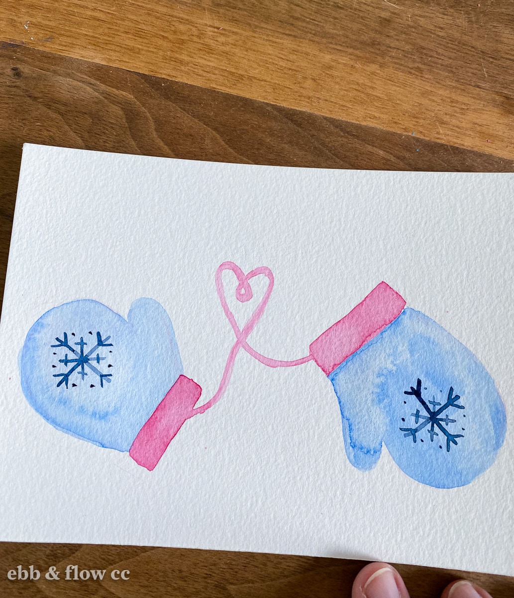 snowflakes on blue mittens illustration