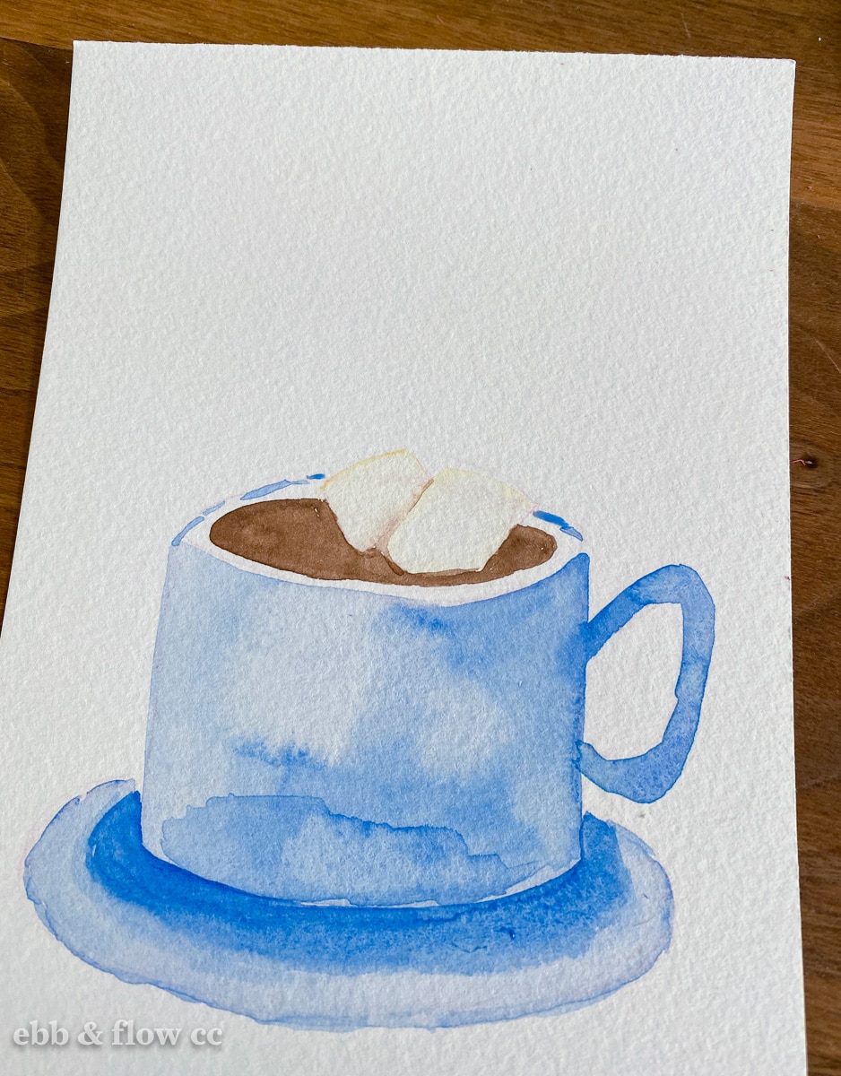 painting of blue cup with hot cocoa 