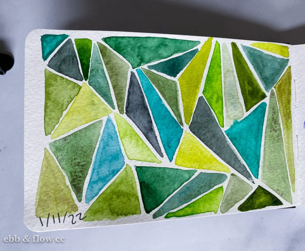 green triangles painted in watercolor