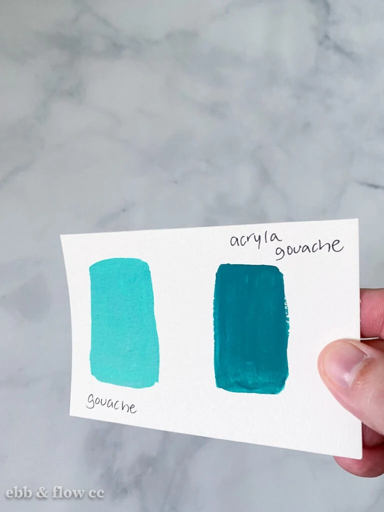 swatches of teal paint on paper