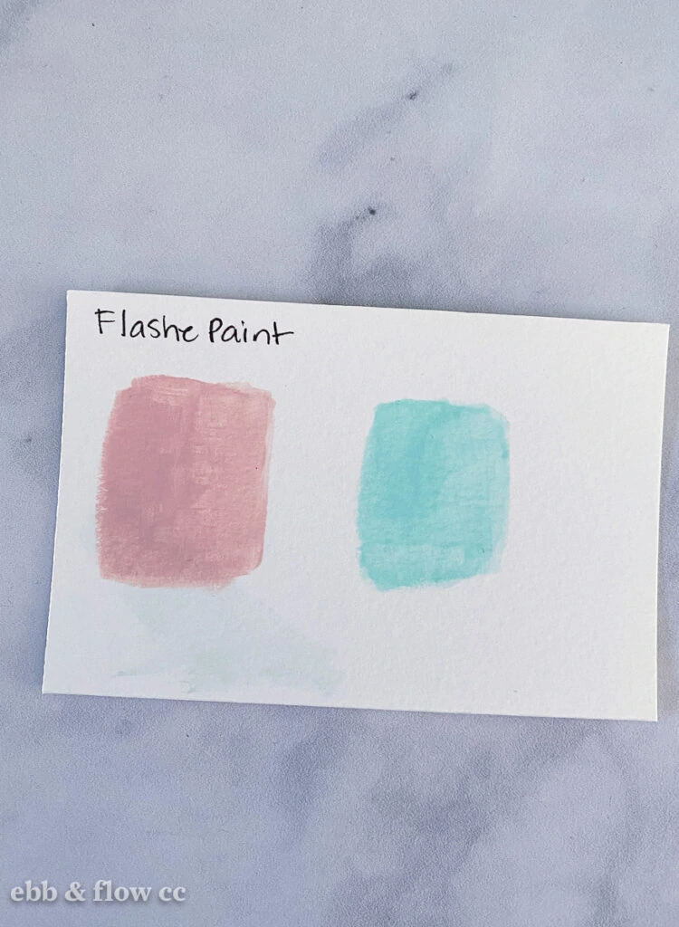 swatches of flashe paint in pink and mint green