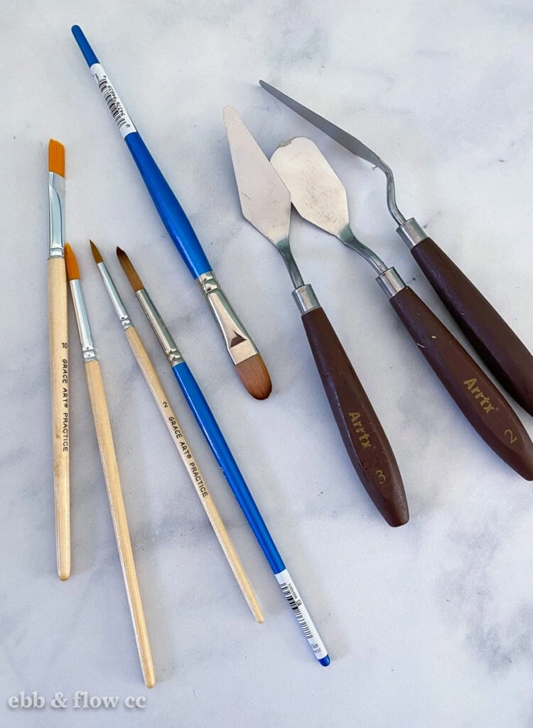 paintbrushes and palette knives