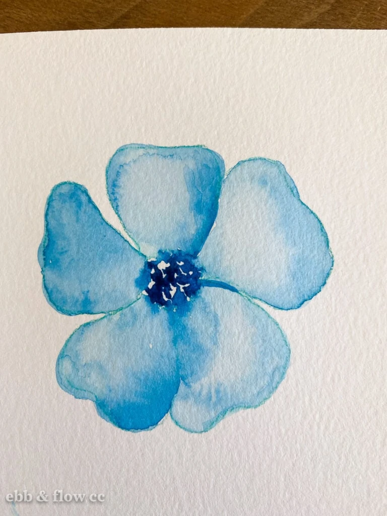 blue flower painted in watercolor