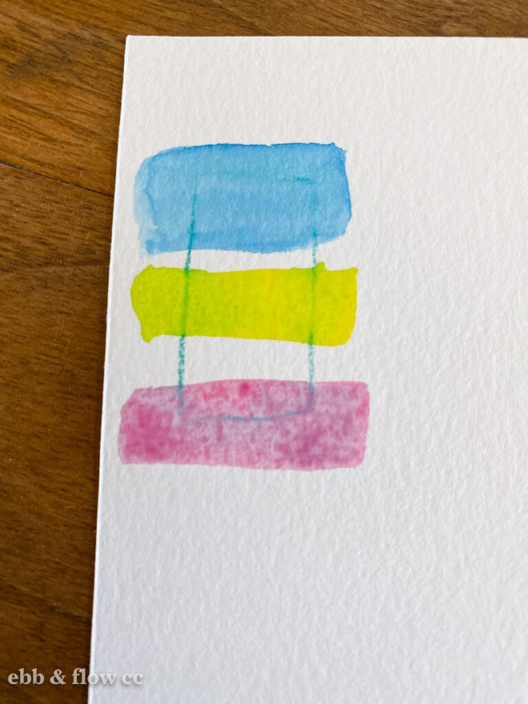 watercolor pencil blending into swatches of paint