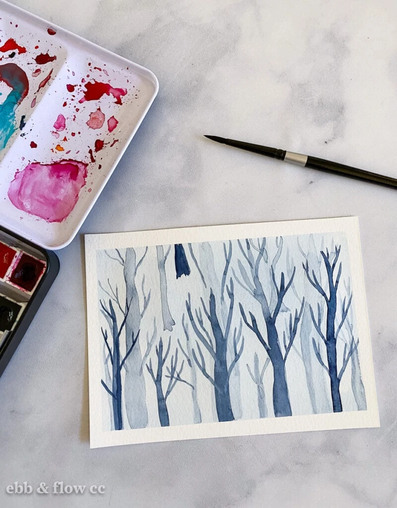 winter forest painted in watercolor paint