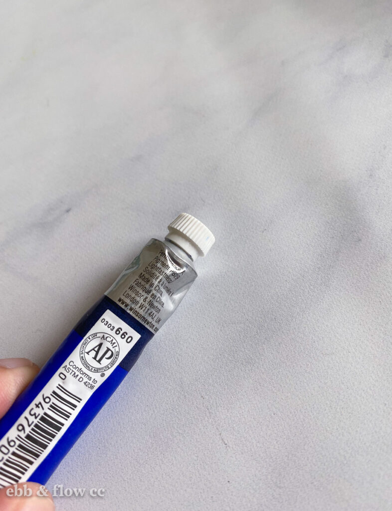 tube of blue paint