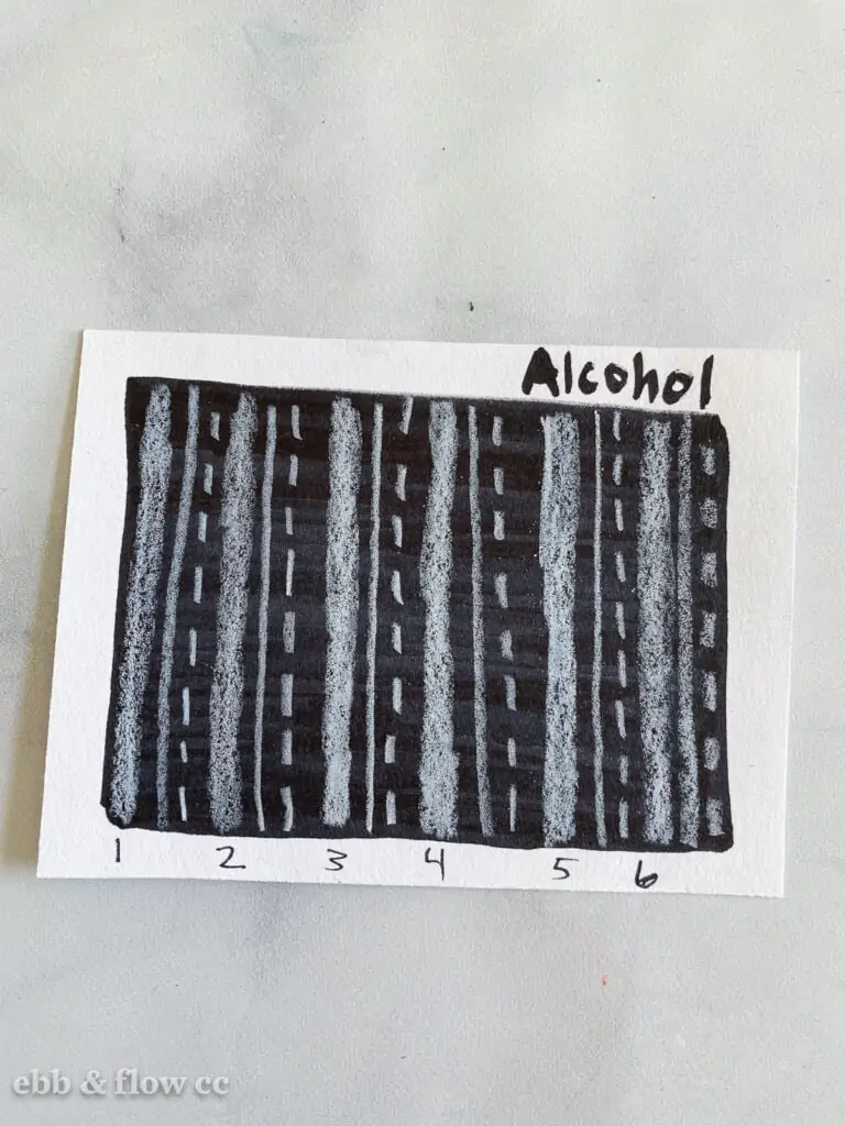 black alcohol marker with white pencil marks