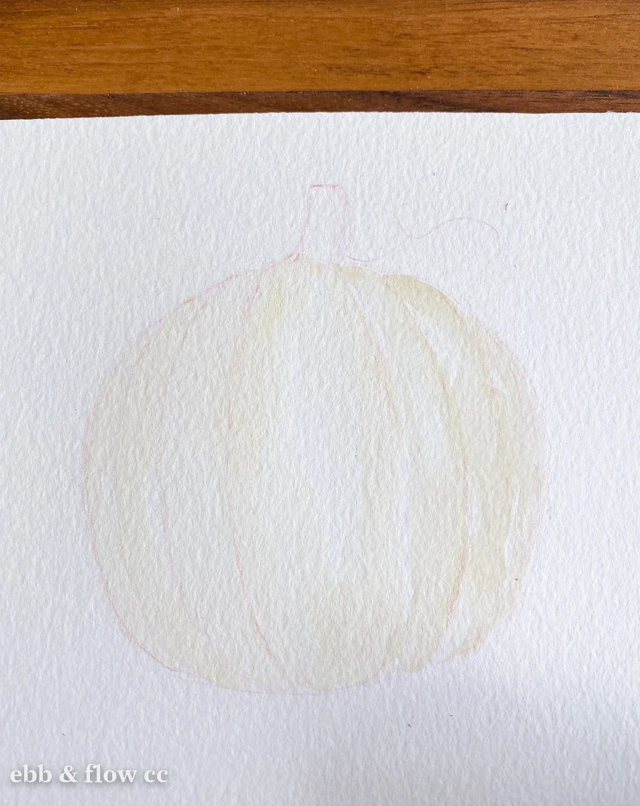 white pumpkin painted with watercolor