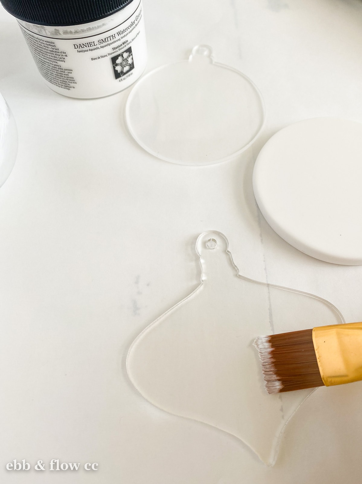 painting ornaments with white gesso