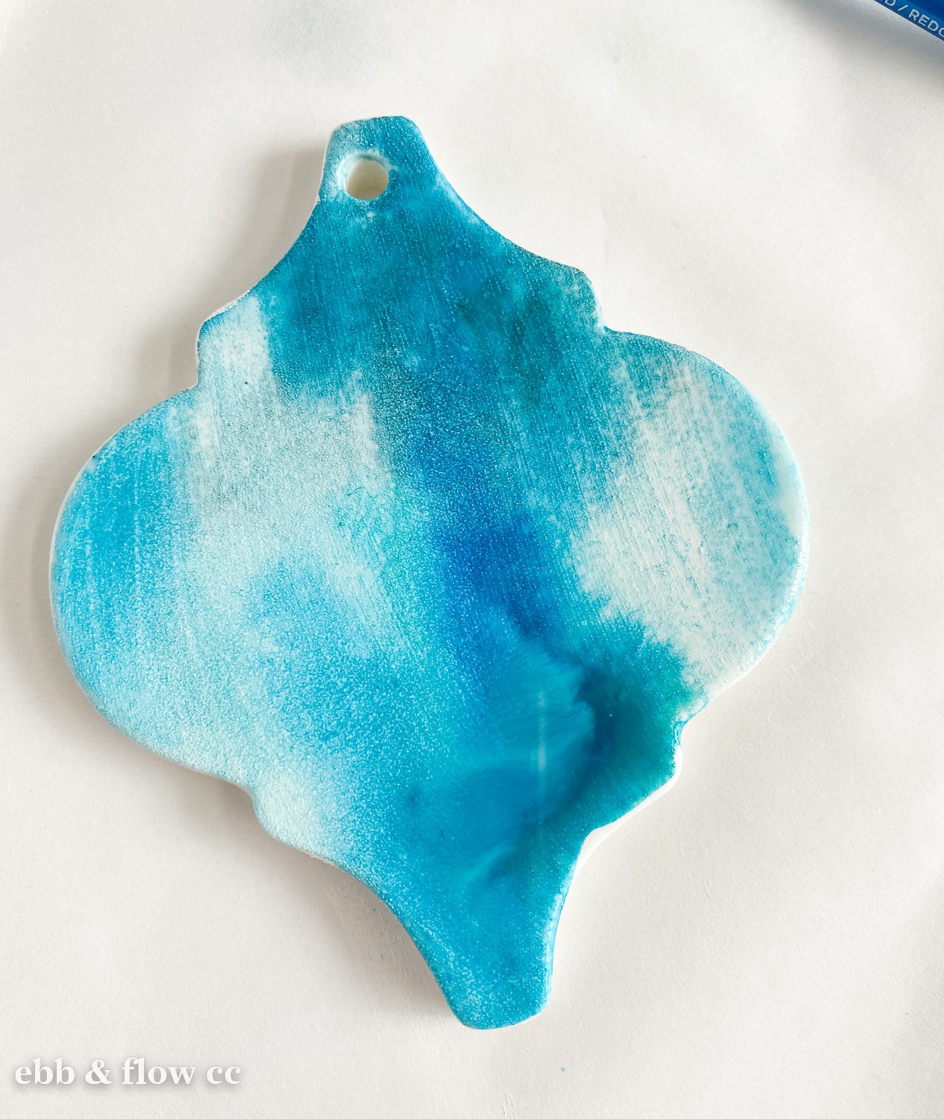 ornament with blue paint