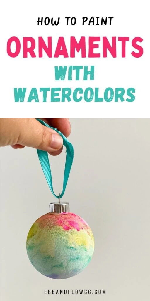 hand holding watercolor ornament ball