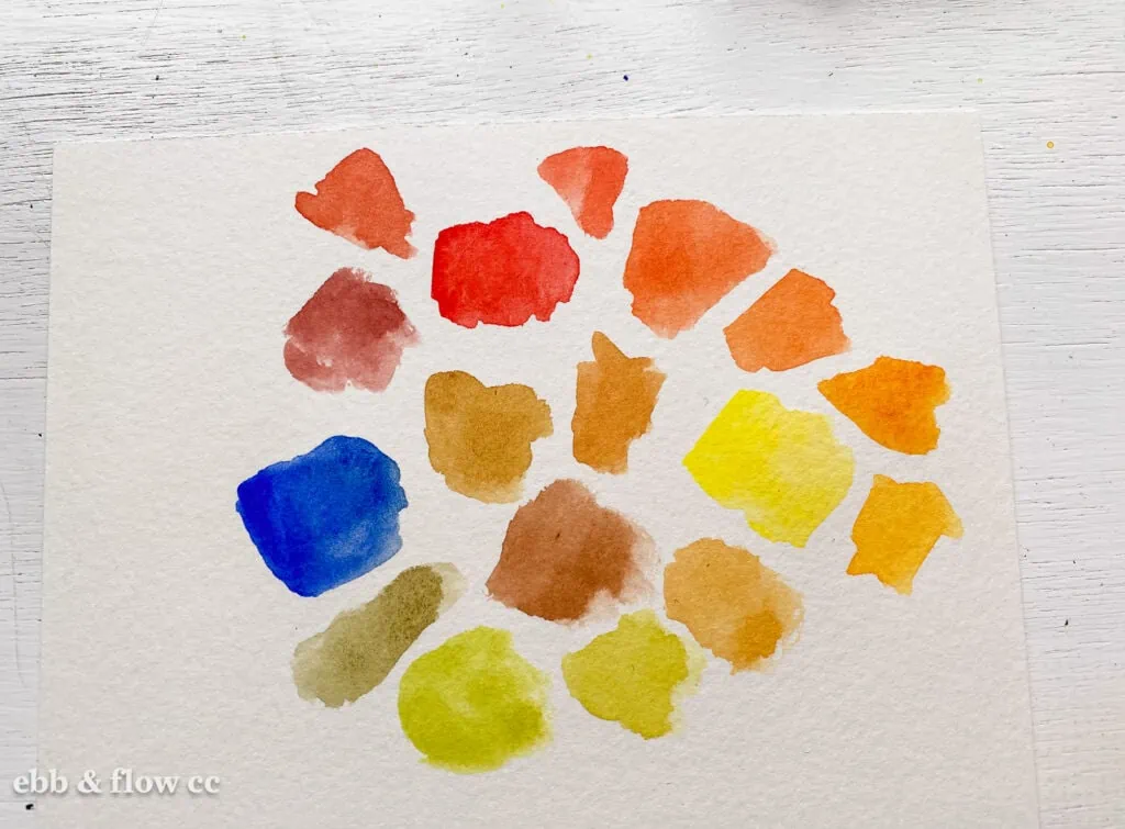 warm colors mixed with primary colors in watercolor