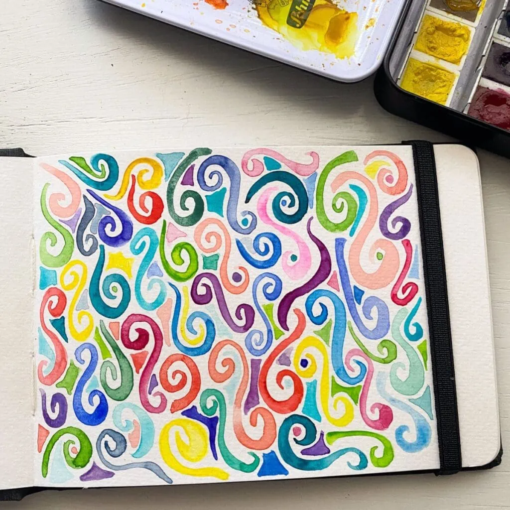 watercolor doodle swirls painting in sketchbook