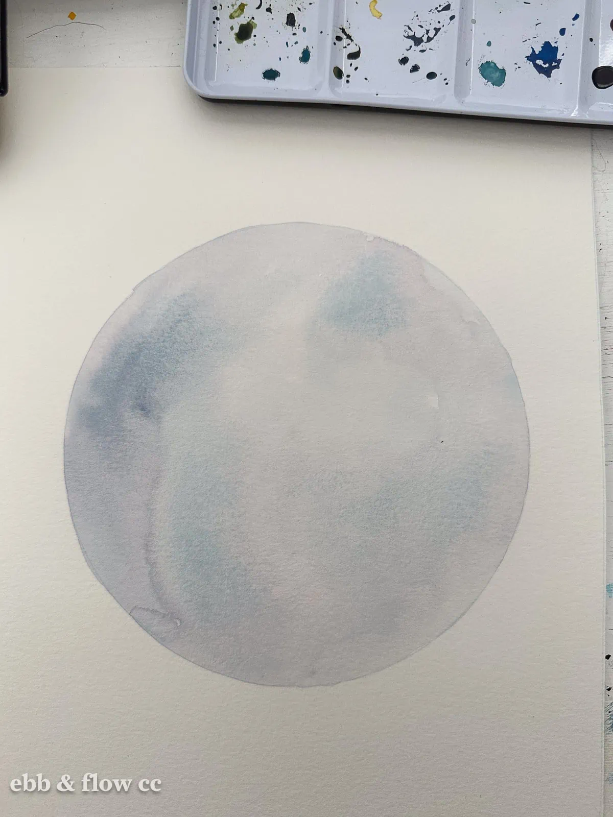 light blue painted circle