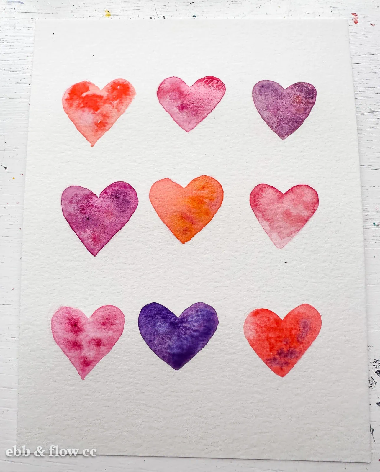 hearts painted in red, pink and purple