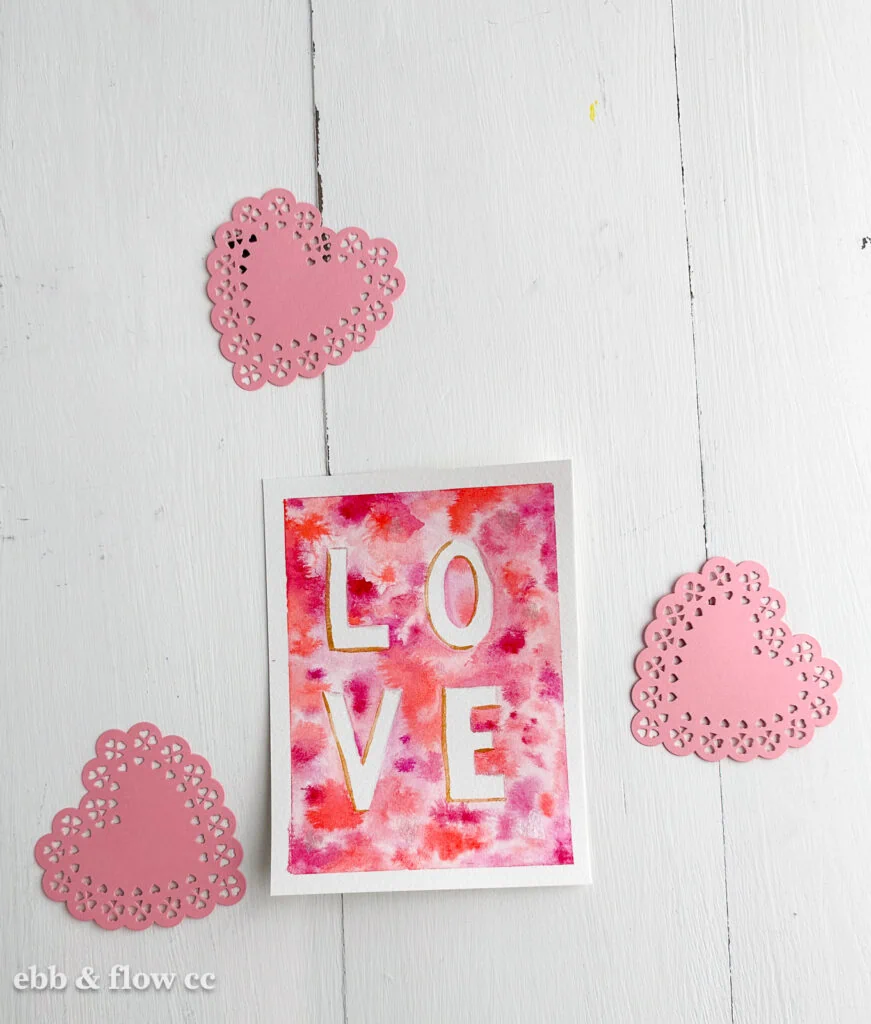 watercolor card that says "love"