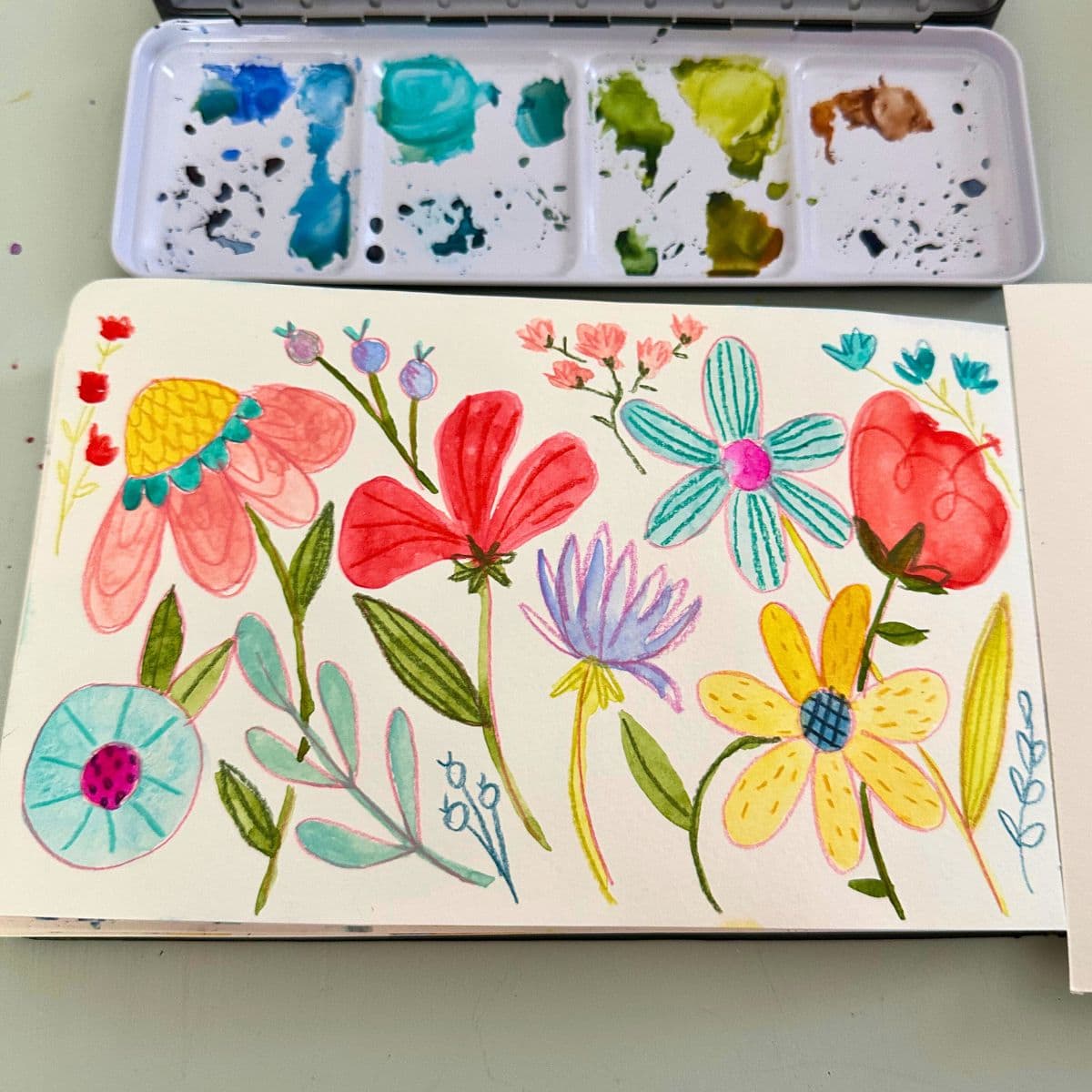 Colorful flowers painted with watercolor paint