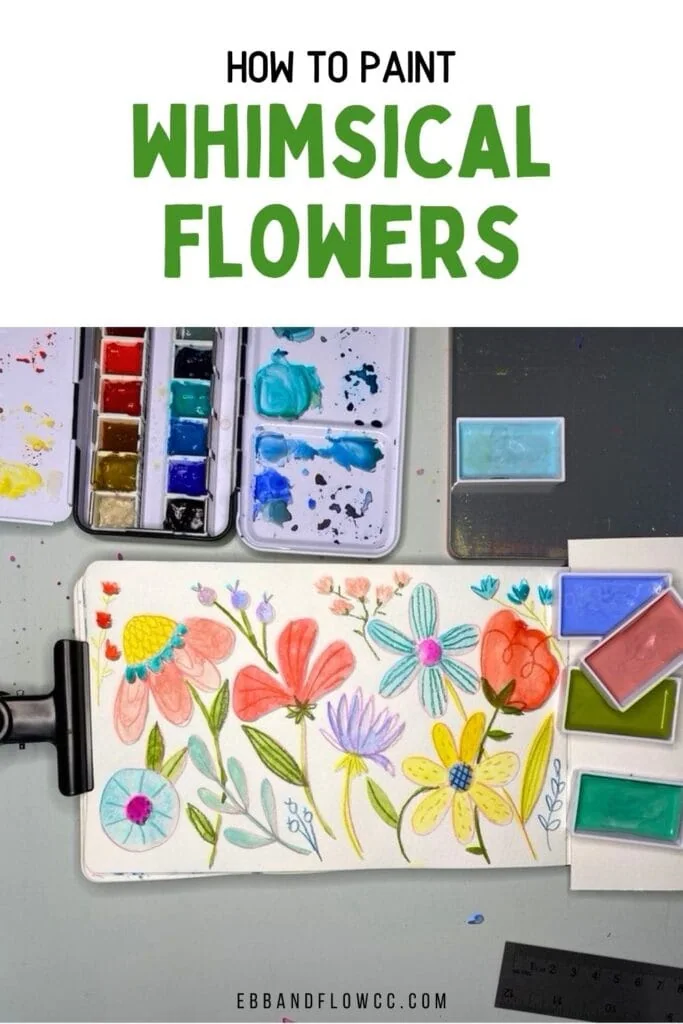 colorful flowers painted with watercolors in a sketchbook