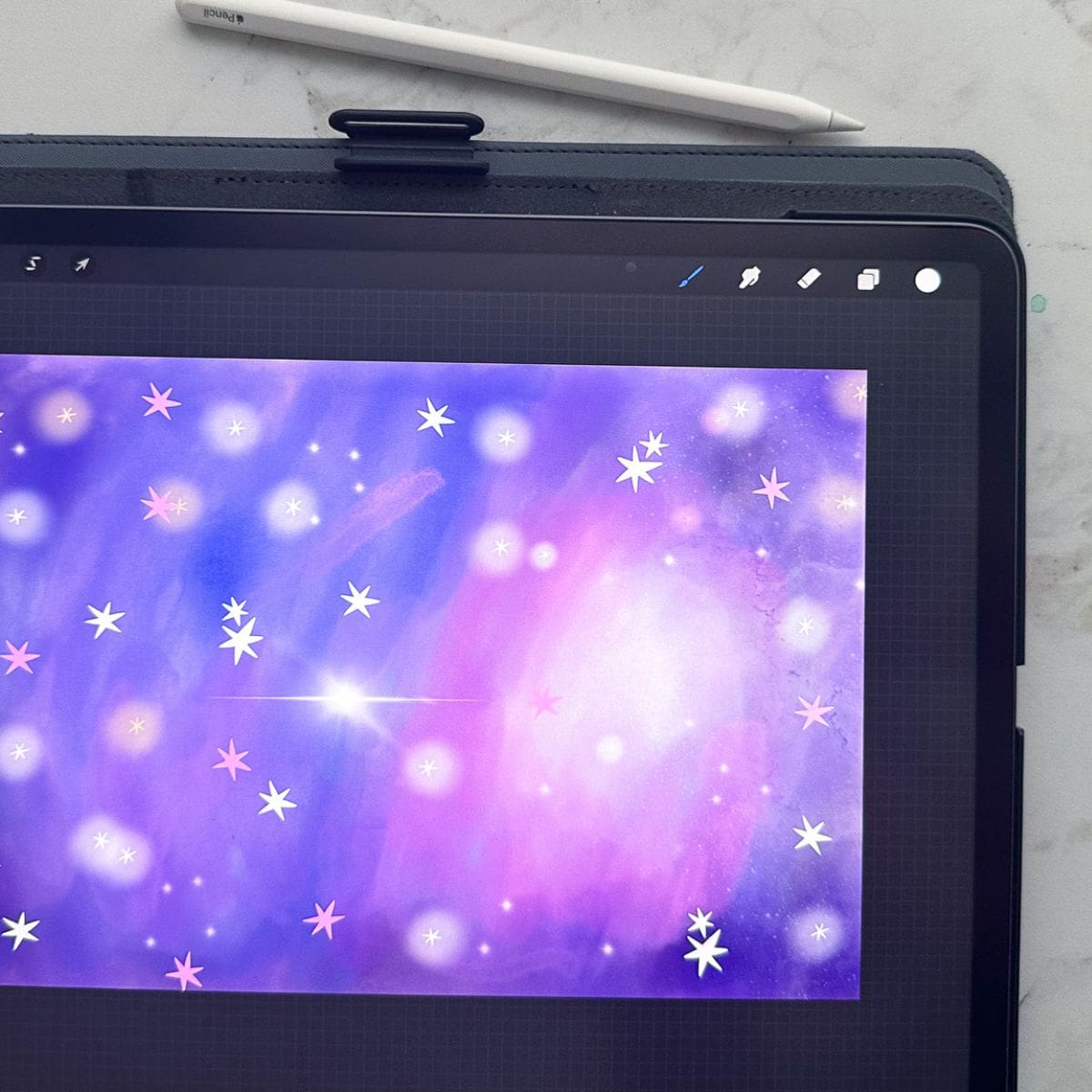 ipad with galaxy illustration