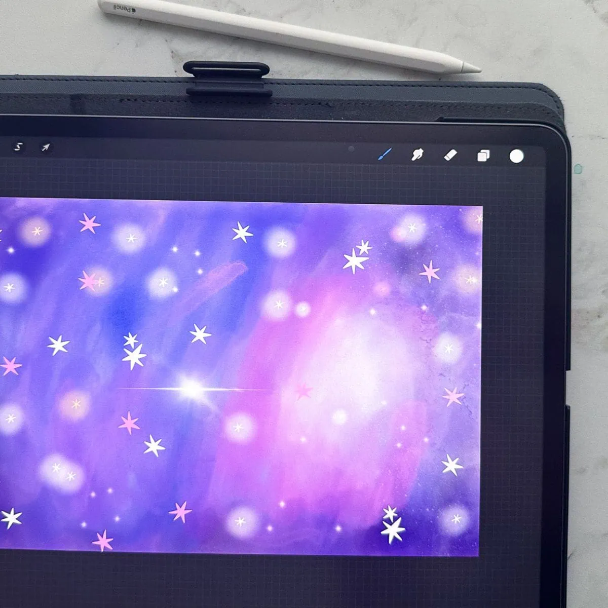 ipad with galaxy illustration