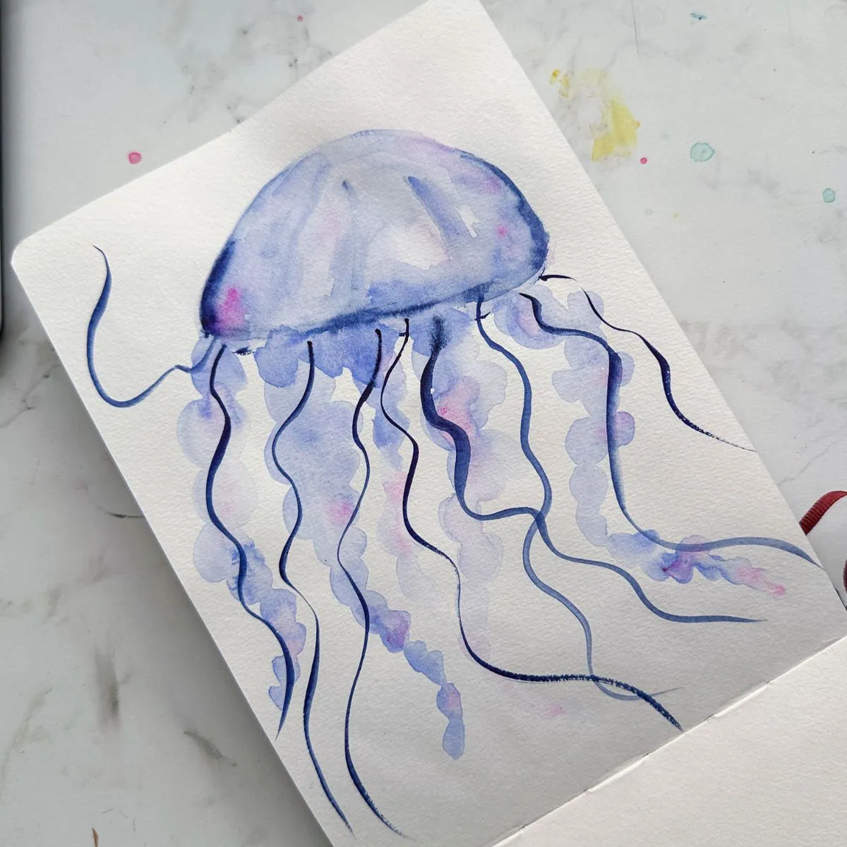 light blue jellyfish painting in watercolor